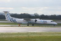 G-JEDW @ EGCC - Taken at Manchester Airport on a typical showery April day - by Steve Staunton