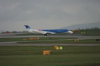 G-RJXB @ EGCC - Taken at Manchester Airport on a typical showery April day - by Steve Staunton