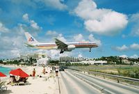 N674AN @ SXM - Landing at SXM - by Dewey Waterman