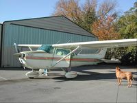 N277CB - beige with green and orange stripes - by D. Russell