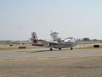 N1121L @ KFCM - Taxiing to the hangar. - by Mitch Sando