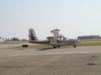N1121L @ KFCM - Taxiing to the hangar. - by Mitch Sando
