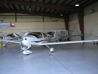 N858DT @ KFCM - Parked inside the hangar at ASI. - by Mitch Sando