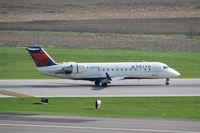 N927CA @ CID - Rolling out after landing on Runway 27