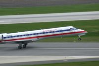 N645AE @ CID - Rotating on take off roll runway 31
