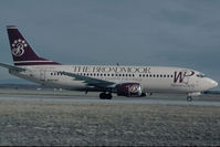 N947WP @ KCOS - Western Pacific Boeing 737-300 - by Yakfreak - VAP