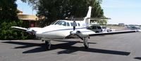 N9488C @ EDU - Cessna T303 - by Reed Maxson