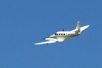 N9488C @ EDU - Cessna T303 departing EDU