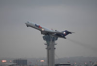 N203FE @ KLAX - Evening departure from LAX - by Duane Johnson