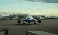 N219UA @ KDEN - Backing away from the gate at DEN - by Duane Johnson