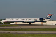 N933LR @ CLT - Mesa Airlines Canadair Regionaljet 900 in US Airways Express colors - by Yakfreak - VAP