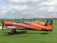 G-ZXCL @ EGBK - Extra 300 in the 2008 colours of The Blades