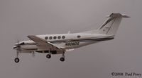 N808DS @ ORF - Another twin churning up the mist