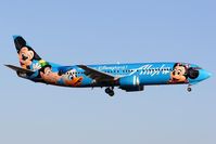 N784AS @ LAX - Alaska Airlines N784AS Spirit of Disneyland (FLT ASA289) from Los Cabos Int'l (MMSD) on short-final to RWY 24R.