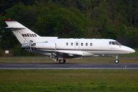 N863QS @ ORF - NetJets 2000 Raytheon Hawker 800XP N863QS (FLT EJA863) rolling out on RWY 23 after arrival from Concord Regional (KJQF) - Concord, NC.