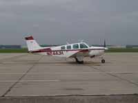 N244JH @ LNK - Pre flight warm up - by Gary Schenaman