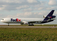 N604FE @ LFPG - Rolling to the Cargo apron... - by Shunn311