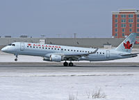 C-FGLX @ CYOW - Air Canada E190 touching down on Rwy 25 - by CdnAvSpotter
