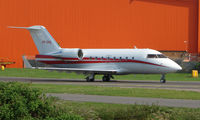 VP-CHL @ EGGW - Challenger 604 ex VP-CKR taxies out at Luton - by Terry Fletcher