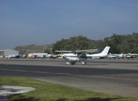 N8206M @ SZP - 1976 Cessna 182P SKYLANE, Continental O-470-S 230 Hp, taxi to refuel - by Doug Robertson