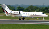 N487QS @ EGGC - Some of the typical traffic that can be seen at Manchester (Ringway)  International - by Terry Fletcher