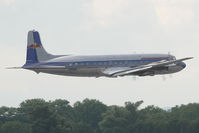 N996DM @ VIE - Red Bull Douglas DC6 - by Yakfreak - VAP