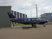 N6475L @ KANE - Starting up on the ramp at Cirrus Flight Operations. - by Mitch Sando