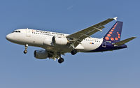 OO-SSP @ BRU - Little Airbus (with the longest range in the A320 family !!!) on short final rwy 02. Contrails visible high above the plane. - by Philippe Bleus