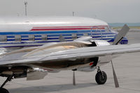 N996DM @ VIE - Red Bull DC6 - by Yakfreak - VAP