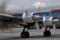 N996DM @ VIE - Red Bull DC6 - by Yakfreak - VAP