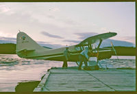 C-FITA - Bob Peel with daughter Wendy & granddaughter Kathy loading up at Lac des Rapides, Sept Iles, Quebec; mid 70's - by Wayne Peel / Roland Theriault
