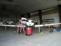 N413R @ KLVN - Parked inside the maintenance hangar. - by Mitch Sando