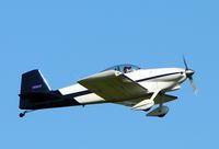N694P @ 5W8 - Departing runway 22 - by John W. Thomas