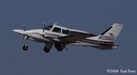 N1306G @ SFQ - Cleaning her up, and outbound - by Paul Perry