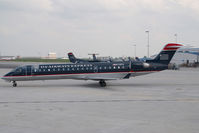N712PS @ CLT - PSA Regionaljet 700 in US AIrways colors - by Yakfreak - VAP