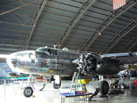 N1042B @ FTW - Getting some well earned love at the home base - Vintage Flying Museum hanger - by Zane Adams