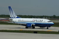 N930UA @ KORD - Boeing 737-500 - by Mark Pasqualino