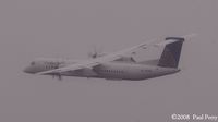 N188WQ @ RDU - A Continental connector getting fast and wet - by Paul Perry