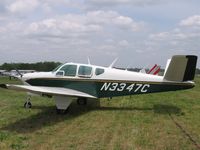 N3347C @ BUY - classic Bonanza - by Tom Cooke