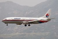 9M-MQO @ VHHH - Malaysia Airlines 737-400