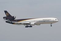 N250UP @ VHHH - UPS MD11 - by Andy Graf-VAP