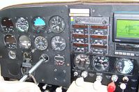 N9449X @ RPJ - Cockpit of C-210A - by William Hamrick