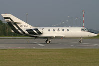 UR-CCB @ VIE - ISD Avia Dassault FAlcon 20 - by Thomas Ramgraber-VAP