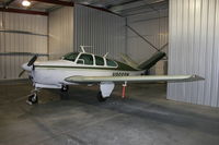N8669M @ FYE - Beech P35 in new T-hangar. - by David K. Mayes