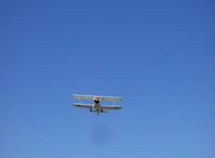 N1702B @ SZP - 1942 Boeing Stearman PT-13D 'Ruthie's Doll', Continental W670 220 Hp, takeoff climbout Rwy 22 - by Doug Robertson