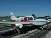 N606EA @ KMKG - on the flightline - preflight - by Matthew Wohlford