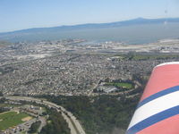 N5111R - Flying past SFO - by Michael Peace