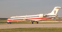 N521AE @ IND - Stuck in the grass - by jay thompson / speedway navigator