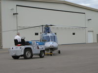 N40NM @ KLVN - Air Care 1 getting pushed back into the hangar. - by Mitch Sando