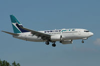 C-FXWJ @ CYYZ - Landing Runway 32 (Canon XT, 70-300mm) - by Shawn Hathaway